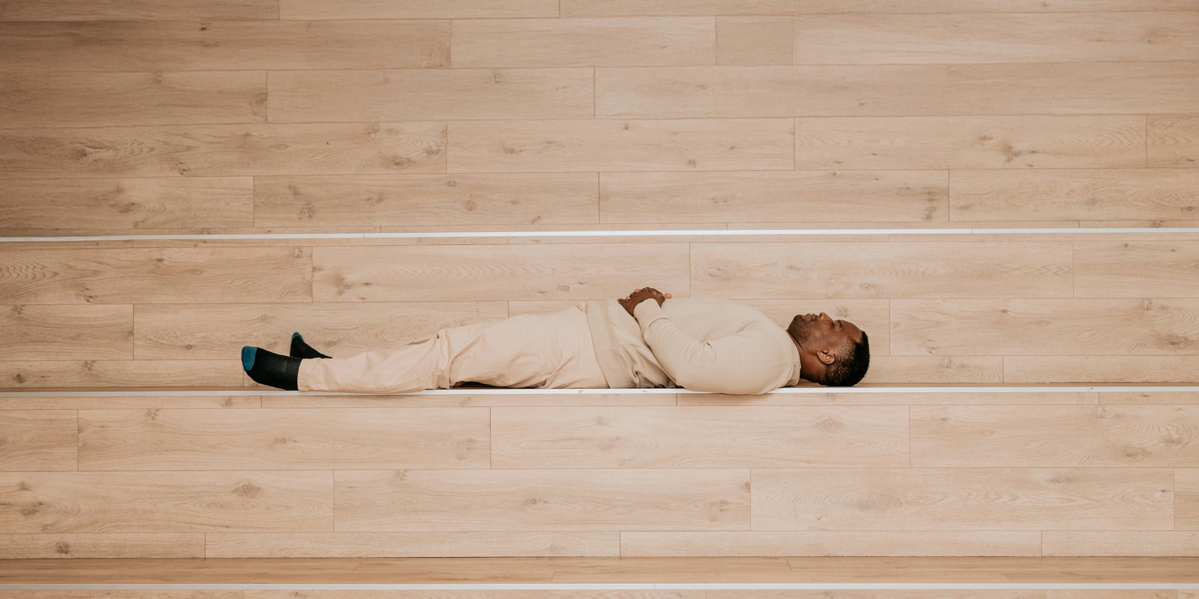 A man laying down thinking